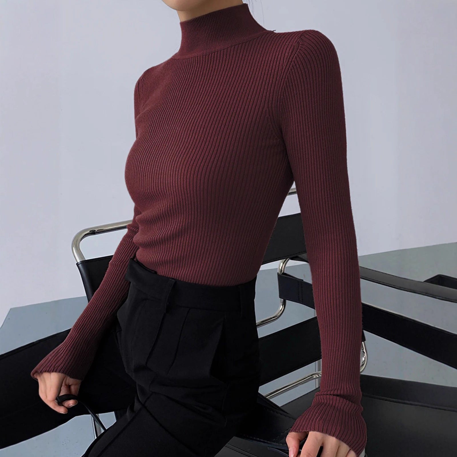 Top lavorato a maglia girocollo aderente alla moda da donna
