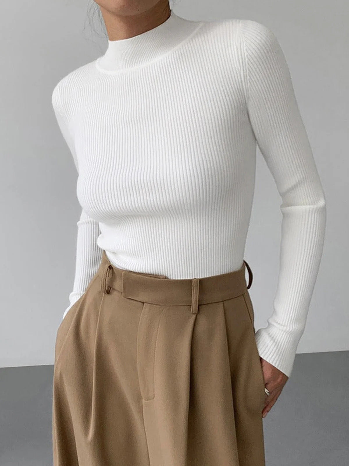 Top lavorato a maglia girocollo aderente alla moda da donna